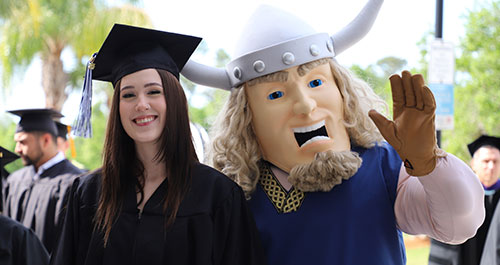 Graduate and Viking Mascot