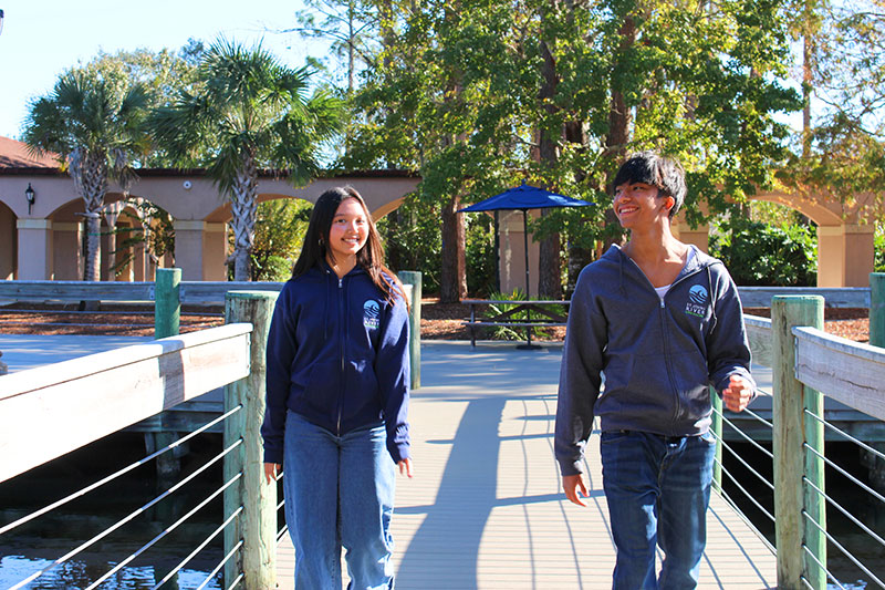students on boardwalk