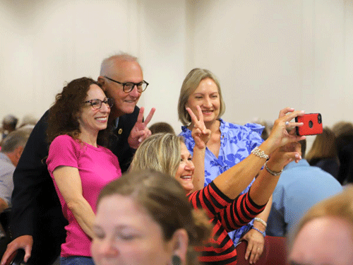 The President taking a selfie with Faculty Members