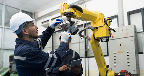 Robotic arm and man with hardhat