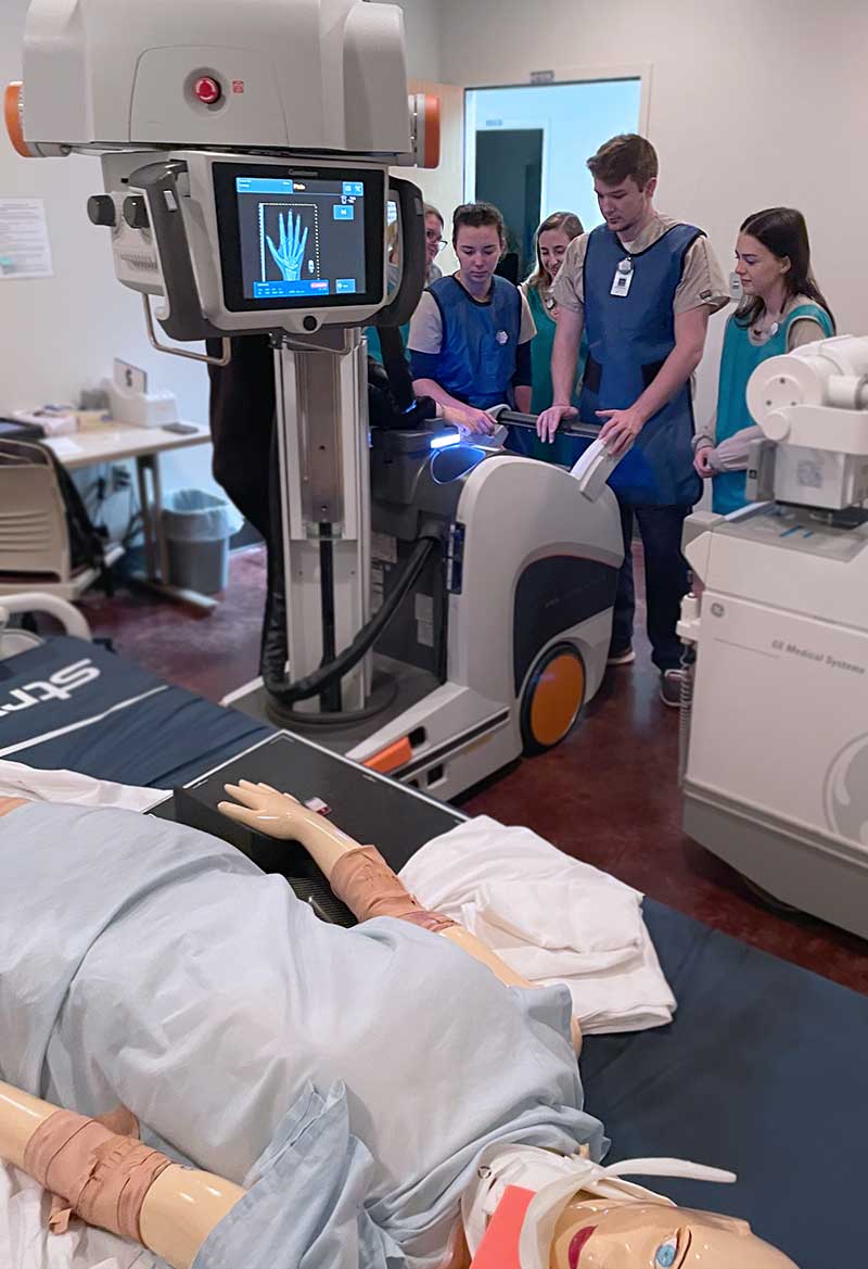 Radiologic Technology and Respiratory Care students using new equipment