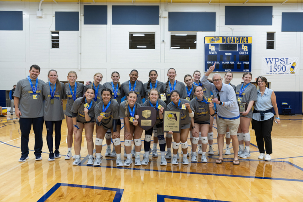 Vikings volleyball team celebrates