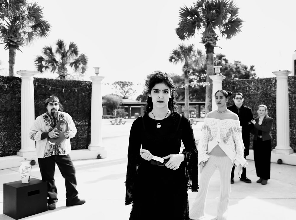 Avenge me. Electra stands in the foreground with a knife. From left Lyle Lopez, Mara Gonzales, Alexandra Pierre, Andrew McClellan and Emma Decker.